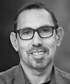 Portrait of Tony Kouzarides